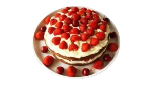 Nahaufnahme einer Erdbeertorte als Illustration für den Prozess der Wahrnehmung der fünf Skandhas.